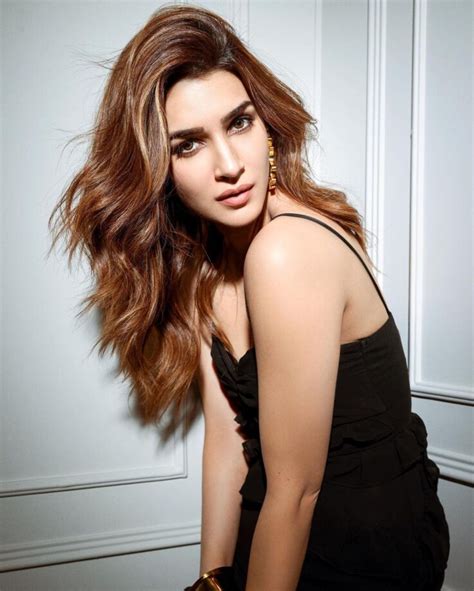 Kriti Sanon Raises Heat In Black Ruffled Thigh Slit Dress See Pics Kriti Sanon Raises Heat In Black Ruffled Thigh Slit Dress See Pics